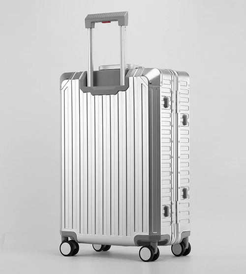 Aluminum magnesium suitcase with four spinner wheels and telescopic handle, natural finish